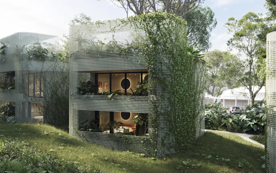 Two-level loft building covered in vegetation